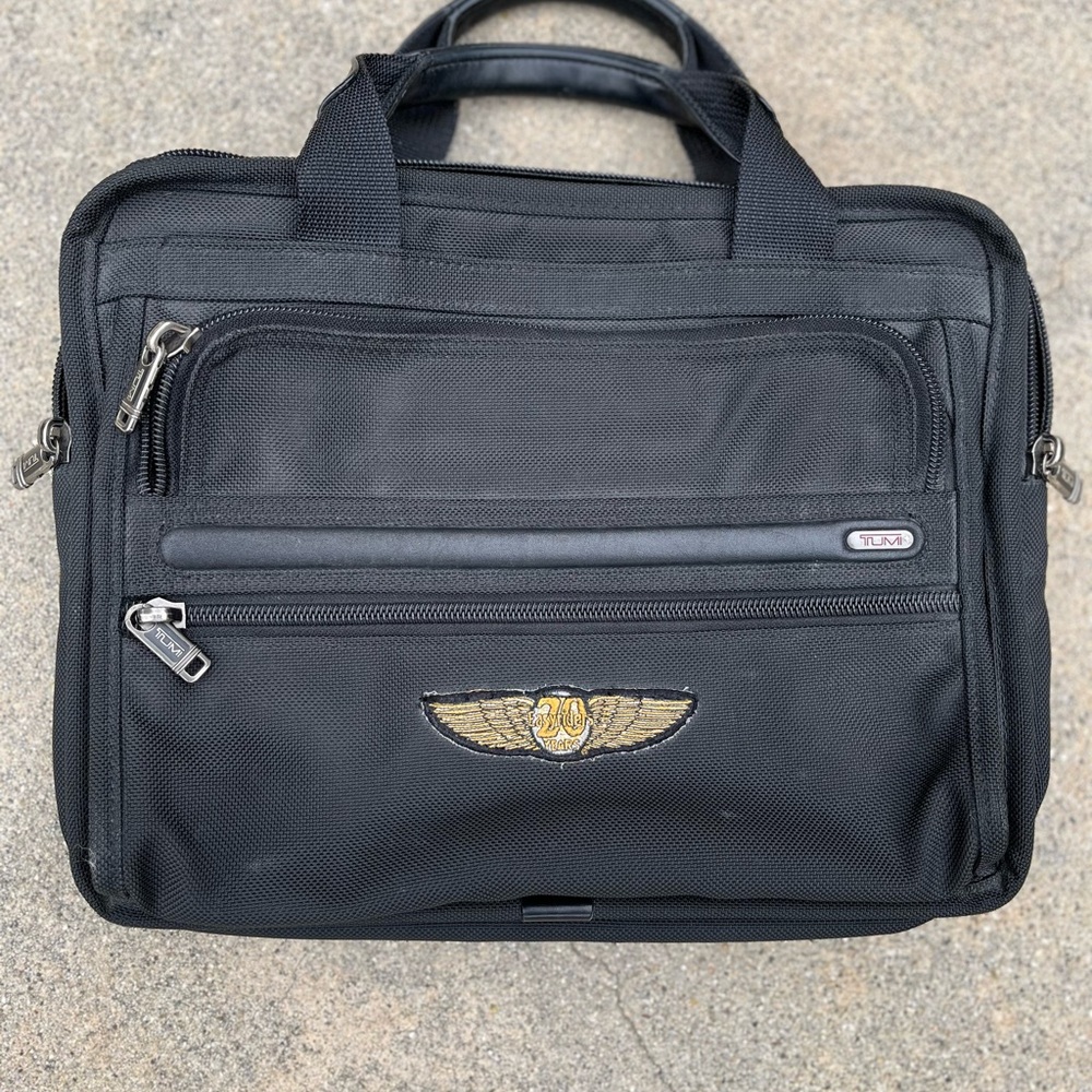 Tumi Black Professional Briefcase with Durable Nylon Design
